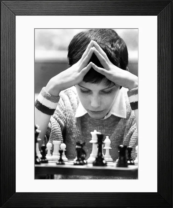 Framed Print : 11 year old Simon Florence concentrates hard in his chess match Framed Print : 11 year old Simon Florence concentrates hard in his chess match