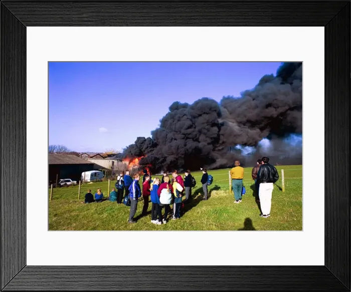 Framed Print : Crowds watch the smoke billow from a fire at Swalwell