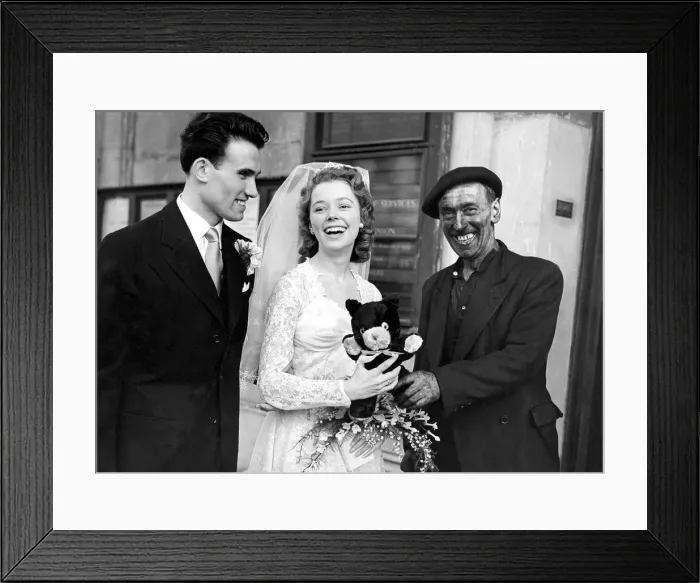 Framed Print : Double luck for the bride, Mrs. Maureen Saunders, as a chimney sweep presents her with a Framed Print : Double luck for the bride, Mrs. Maureen Saunders, as a chimney sweep presents her with a
