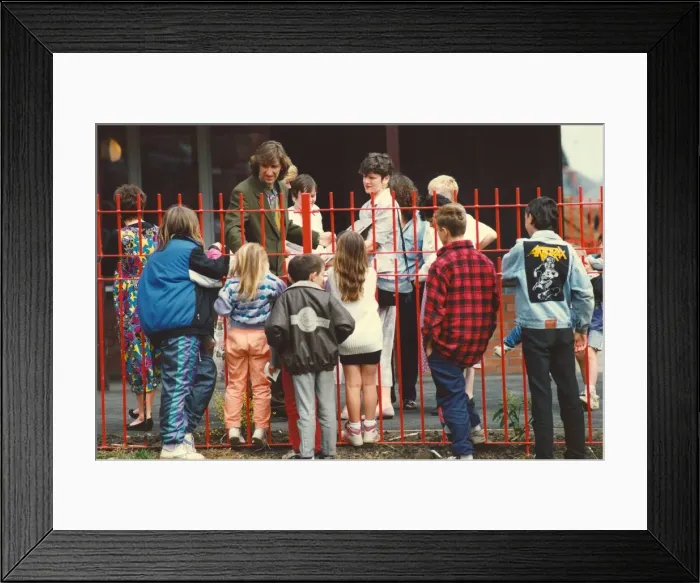 Framed Print : Jimmy Nail was the centre of attraction to the children of Walker as he returned to his Framed Print : Jimmy Nail was the centre of attraction to the children of Walker as he returned to his