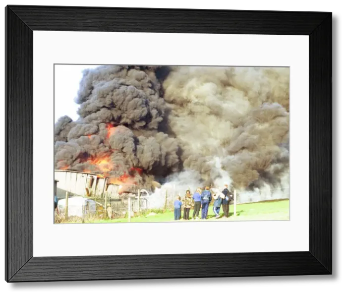 Framed Print : Crowds watch the smoke billow from a fire at Swalwell