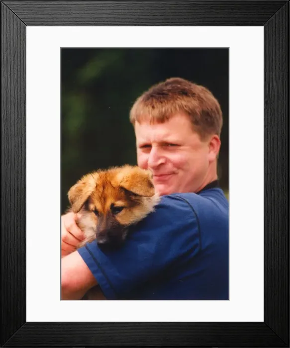 Framed Print : Police Officer Paul Dover with puppy Asa Framed Print : Police Officer Paul Dover with puppy Asa