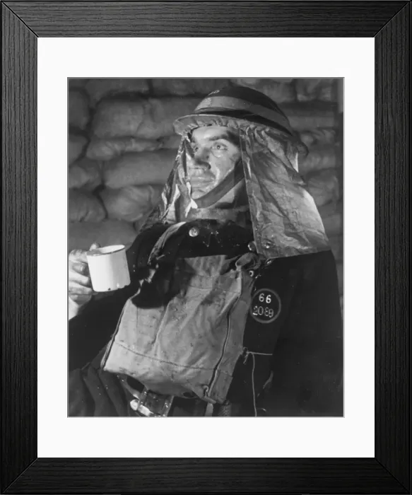 Framed Print : A firefighter takes a well earned break for a cup of tea after attending to many bombed