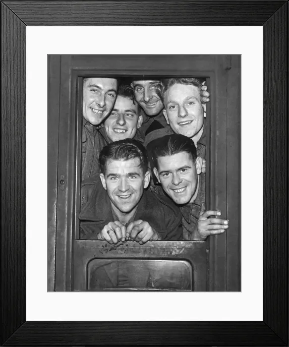 Framed Print : Scenes on an army train taking troops back to the front after being on leave during