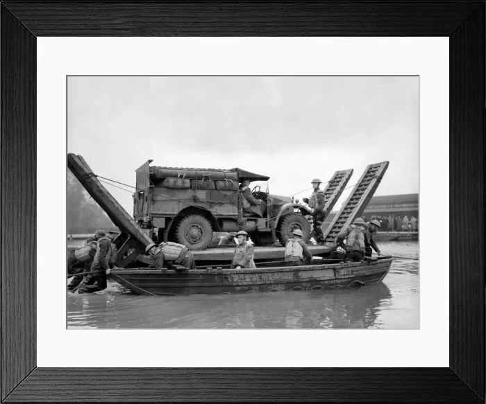 Framed Print : British army soldiers with an all terrain vehicle crossing over water on a pontoon during Framed Print : British army soldiers with an all terrain vehicle crossing over water on a pontoon during