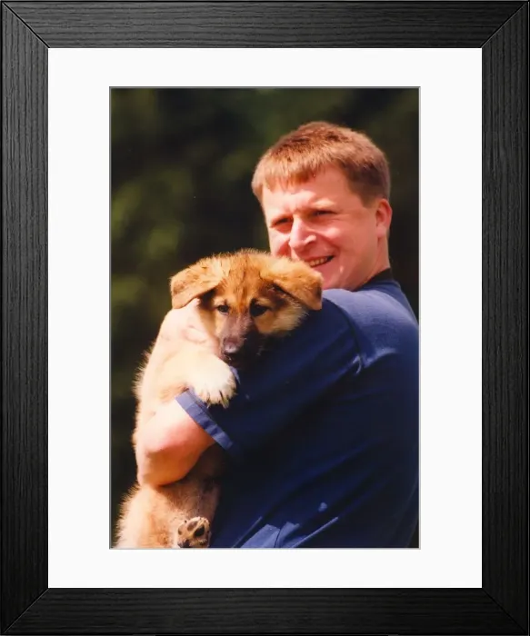 Framed Print : Police Officer Paul Dover with puppy Asa Framed Print : Police Officer Paul Dover with puppy Asa