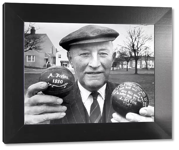 Mr. Joe Iceton, of Sedgefield, with two of the footballs used in the past Shrove Tuesday