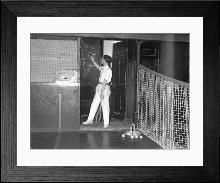 Framed Print : Real Tennis, player keeps score beside the court. Circa 1933 Framed Print : Real Tennis, player keeps score beside the court. Circa 1933