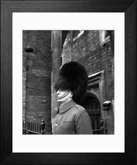 Framed Print : A man of the Coldstream Guards on duty outside Buckingham Palace wearing the traditional