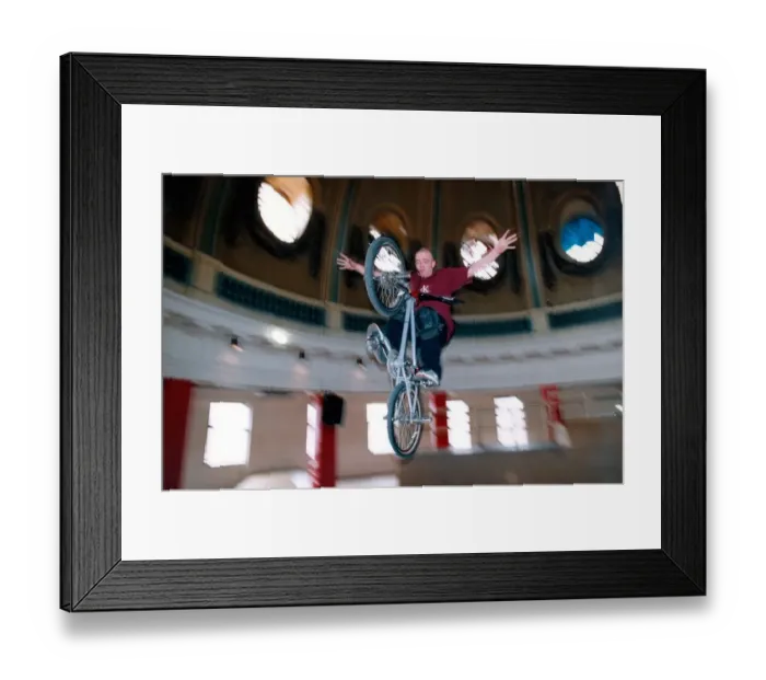 Framed Print : Dave Young shows his skills on the new bike and skateboard ramps inside the Spanish City