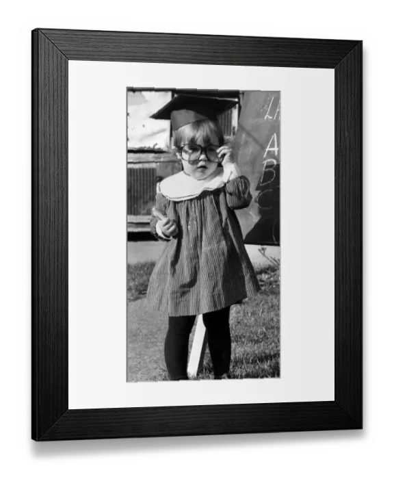 Framed Print : Children: Clever: Little Miss clever clogs: Mini-mastermind Laura Cooley in only 18 Framed Print : Children: Clever: Little Miss clever clogs: Mini-mastermind Laura Cooley in only 18