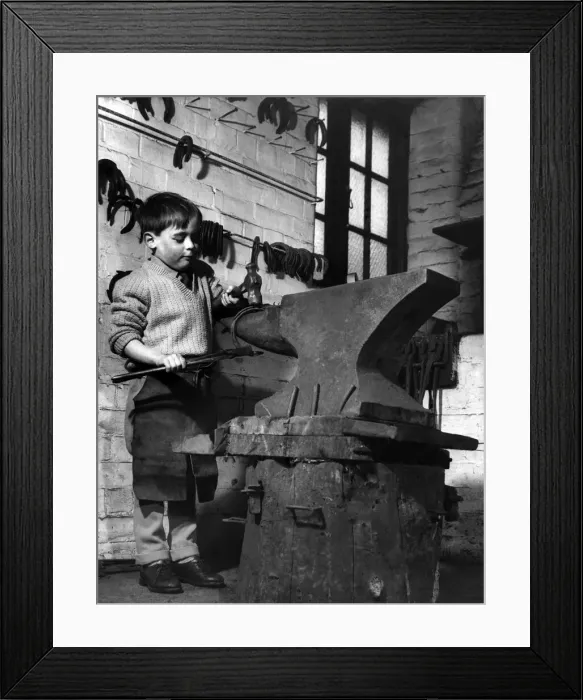 Framed Print : Children: Clever: He just forging ahead: A big job for a small lad Framed Print : Children: Clever: He just forging ahead: A big job for a small lad