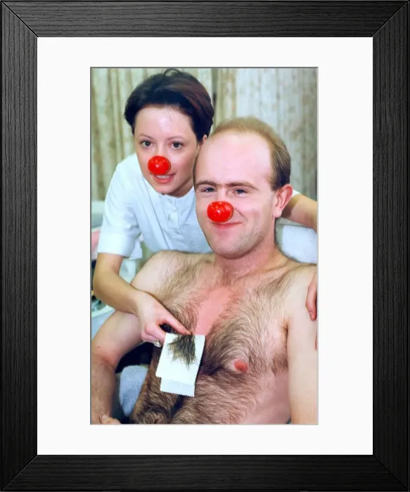 Framed Print : This man is prepared to suffer for Comic Relief in March 1995 Framed Print : This man is prepared to suffer for Comic Relief in March 1995