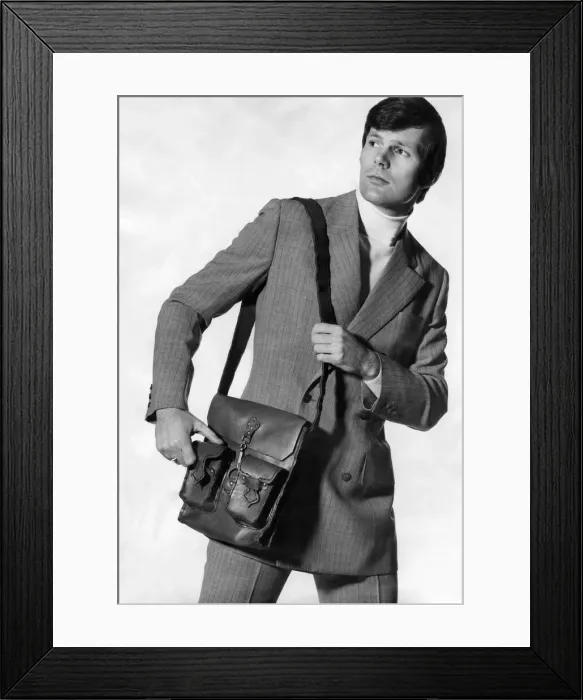 Framed Print : Bag That man. Now a man can go anywhere with nothing in his pockets