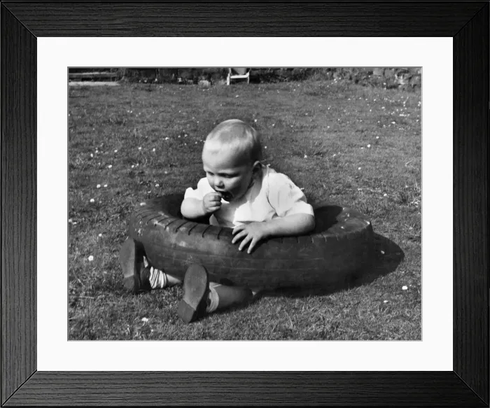 Framed Print : Children: Babies: The boy who had difficulty in finding his feet!!! May 1953 P023441