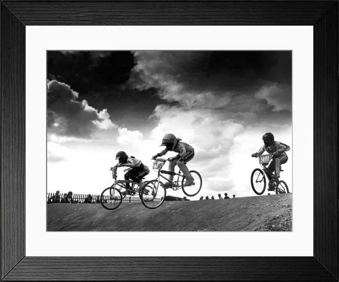 Framed Print : The under 9 girls go through their paces as another heat of the UK BMX Grand Prix Framed Print : The under 9 girls go through their paces as another heat of the UK BMX Grand Prix