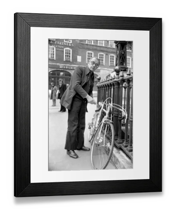 Framed Print : Larry Adler, musician seen here with his push bike. April 1975 S75-1891