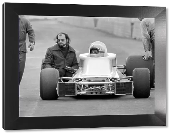Racing driver John Surtees and his new racing car. January 1976 S76-0088-001