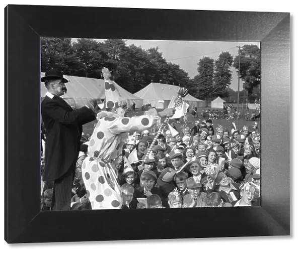Clowns seen here performing at the Twickenham Garden Fete. Circa 1930