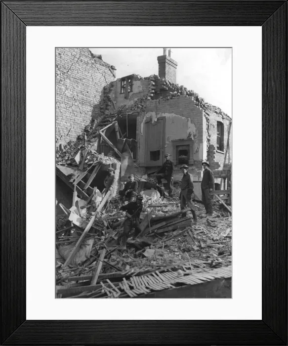 Framed Print : Rescue workers searching for victims in a Coventry house after the air raid Framed Print : Rescue workers searching for victims in a Coventry house after the air raid