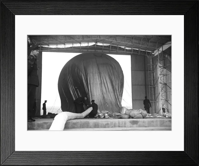 Framed Print : Barrage Balloon being filled in its hangar at Hook, Surrey. October 1938 Framed Print : Barrage Balloon being filled in its hangar at Hook, Surrey. October 1938