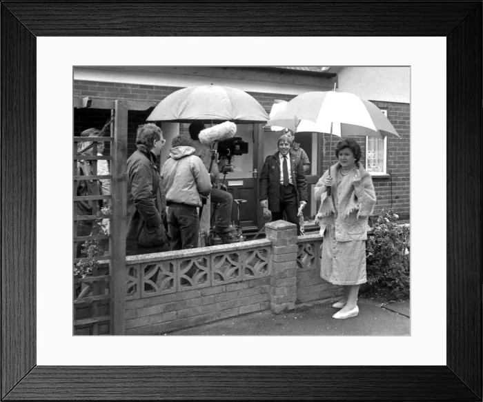 Framed Print : Lights, camera... but very little action. That was the scene as a camera crew filmed a Framed Print : Lights, camera... but very little action. That was the scene as a camera crew filmed a