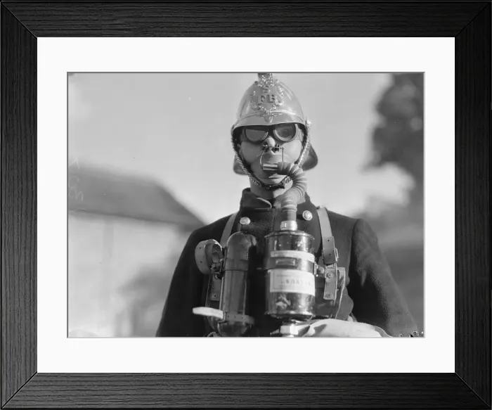 Framed Print : Surbiton Fire Brigade Display. October 1933 A fireman wearing smoke apparatus