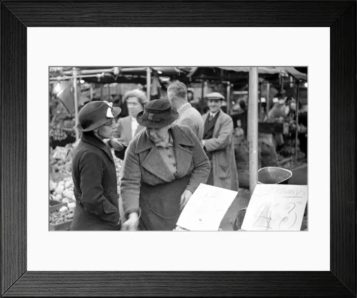 Framed Print : Shoppers at the green grocers stall in Kingston Market. Circa 1936 Framed Print : Shoppers at the green grocers stall in Kingston Market. Circa 1936