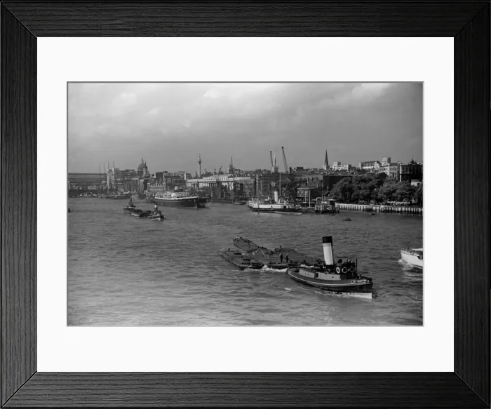 Framed Print : The River Thames and the pool of London seen from the road deck of Tower Bridge Framed Print : The River Thames and the pool of London seen from the road deck of Tower Bridge