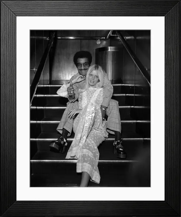 Framed Print : Sammy Davis party. Sammy Davis Jnr. pictured with a young Woman. 12th May 1973