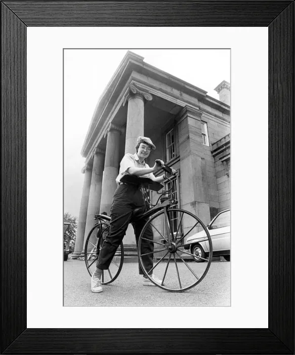 Framed Print : Dr. Helen Sinclair tries out the oldest bicycle on show at Monkwearmouth Museum Framed Print : Dr. Helen Sinclair tries out the oldest bicycle on show at Monkwearmouth Museum