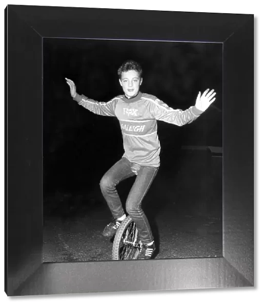 Schoolboy stunt rider Neil Cliff on his unicycle