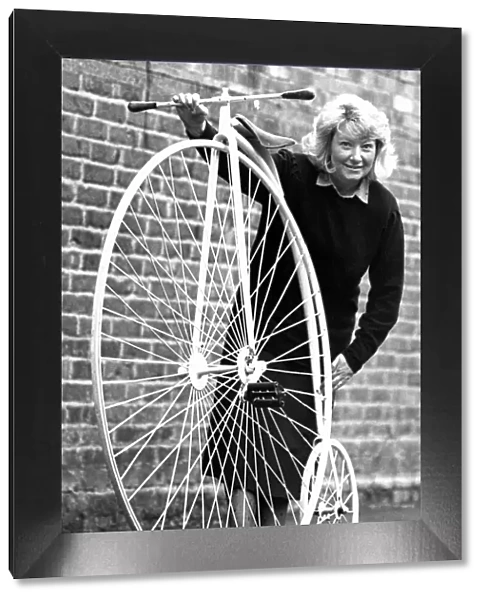 Auctioneer Barbara Turner with an old but in good condition penny farthing