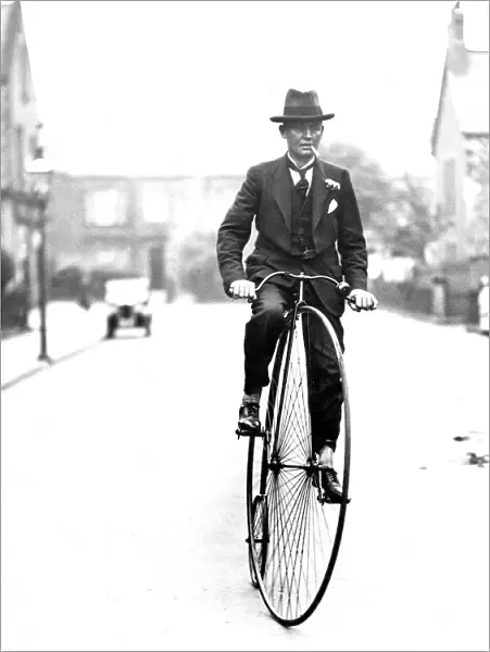 A very smart gentleman on his penny farthing
