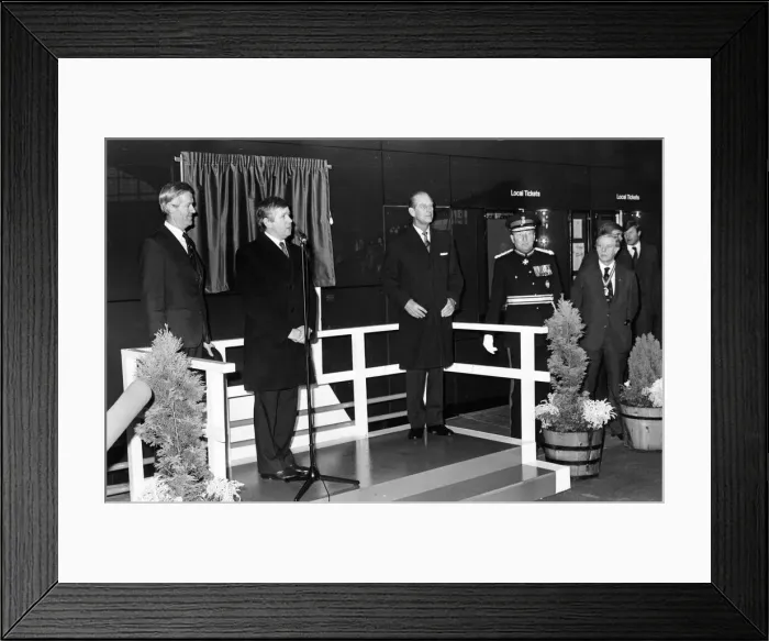Framed Print : Prince Philip, Duke of Edinburgh, unveils a plaque at the new Travel Centre in Framed Print : Prince Philip, Duke of Edinburgh, unveils a plaque at the new Travel Centre in