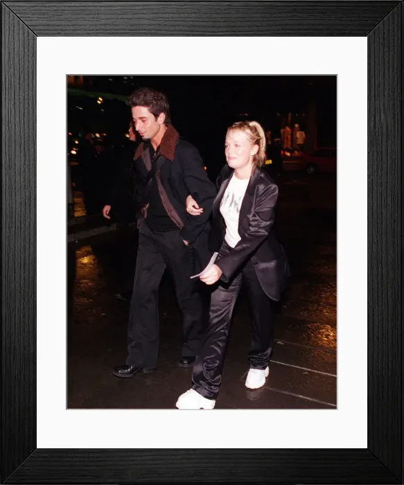 Framed Print : Emma Bunton of The Spice Girls in Glasgow April 1998 arm in arm with unknown man Framed Print : Emma Bunton of The Spice Girls in Glasgow April 1998 arm in arm with unknown man