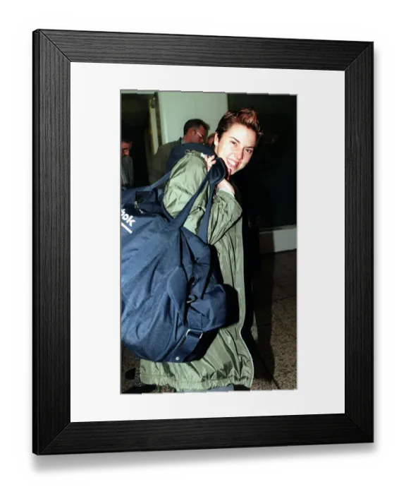 Framed Print : Mel-C at Glasgow Airport December 1999