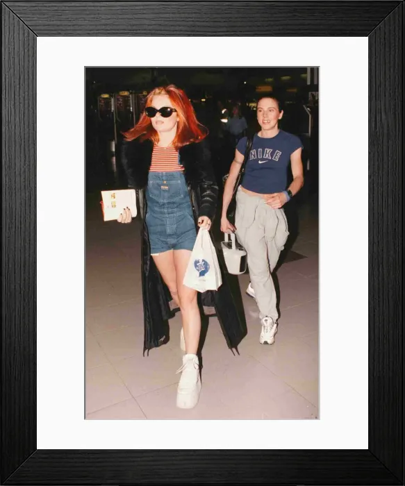 Framed Print : Geri and Mel C of the Spice girls leave Heathrow for Paris 1997 Framed Print : Geri and Mel C of the Spice girls leave Heathrow for Paris 1997
