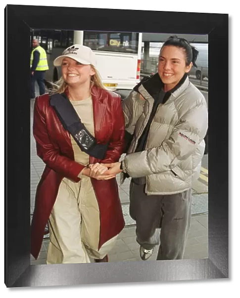The Spice Girls Emma Bunton and Mel C November 1998 leave Heathrow Airport for Chicago