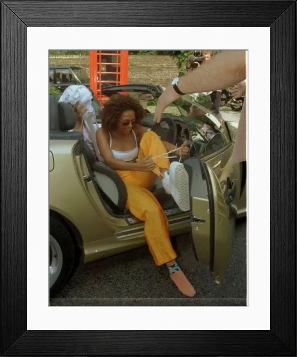 : Mel B Spice Girls Pop Group August 1997 Scary Spice getting out off car : Mel B Spice Girls Pop Group August 1997 Scary Spice getting out off car