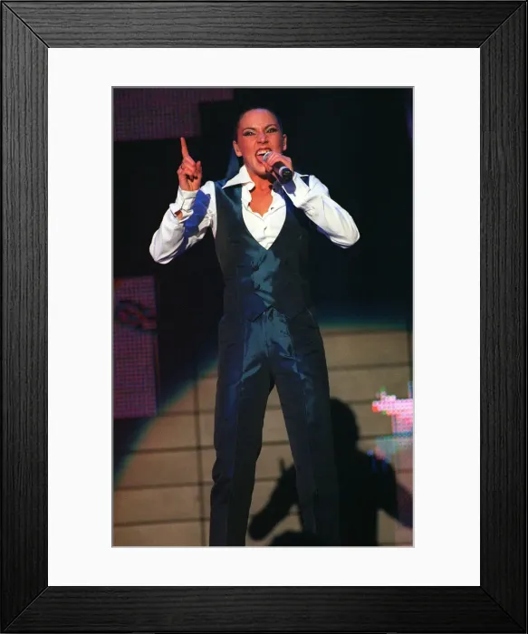 Framed Print : Spice Girls concert at the SECC Glasgow April 1998 Mel C wears waistcat trousers pointing Framed Print : Spice Girls concert at the SECC Glasgow April 1998 Mel C wears waistcat trousers pointing