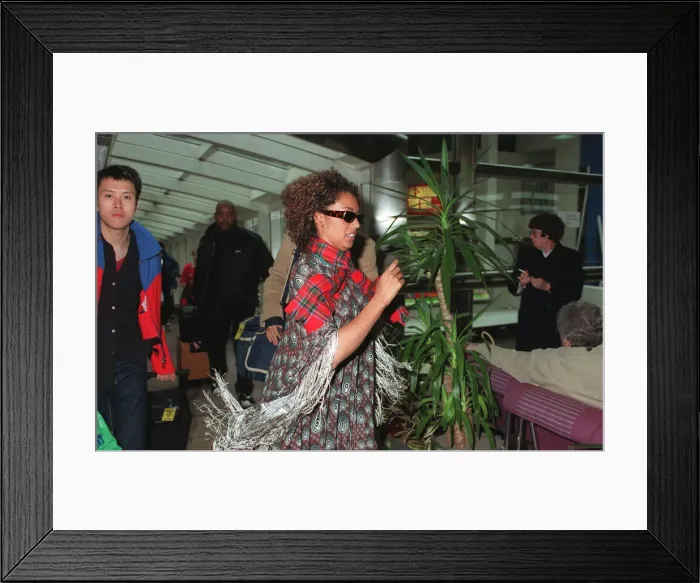 Framed Print : Spice Girls Mel B wearing a tartan scarf and sunglasses April 1998 Framed Print : Spice Girls Mel B wearing a tartan scarf and sunglasses April 1998