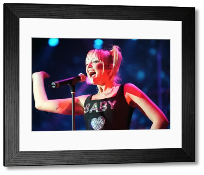 Framed Print : Emma Bunton Baby Spice Spice Girls on stage Glasgow SECC April 1998 singing into