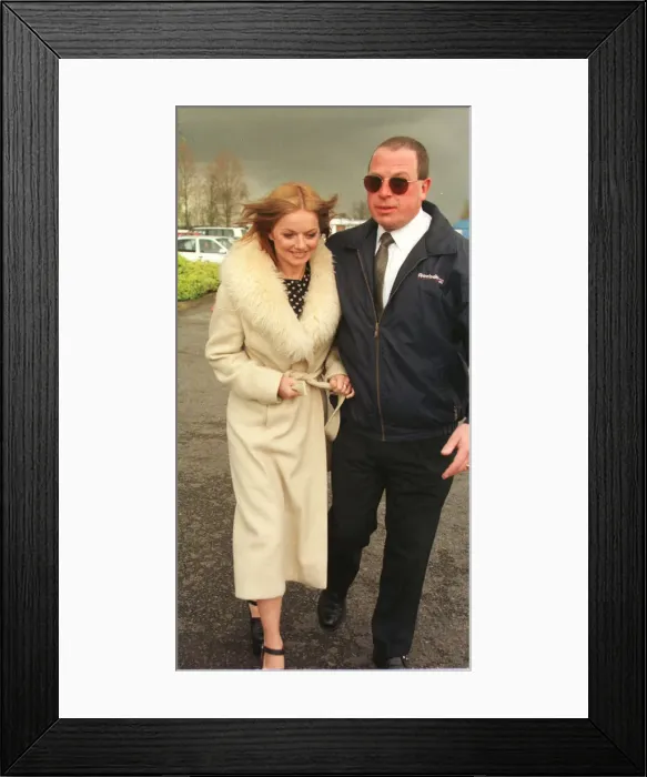 Framed Print : Geri Halliwell Ginger Spice in fur trimmed coat walks to the helicopter as she prepares
