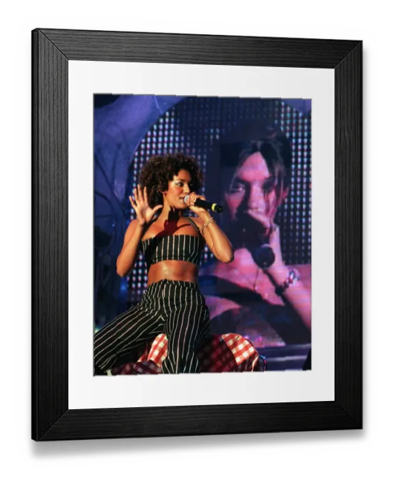 Framed Print : Spice Girls Mel B singing on stage during their concert at Glasgow SECC April 1998 Framed Print : Spice Girls Mel B singing on stage during their concert at Glasgow SECC April 1998