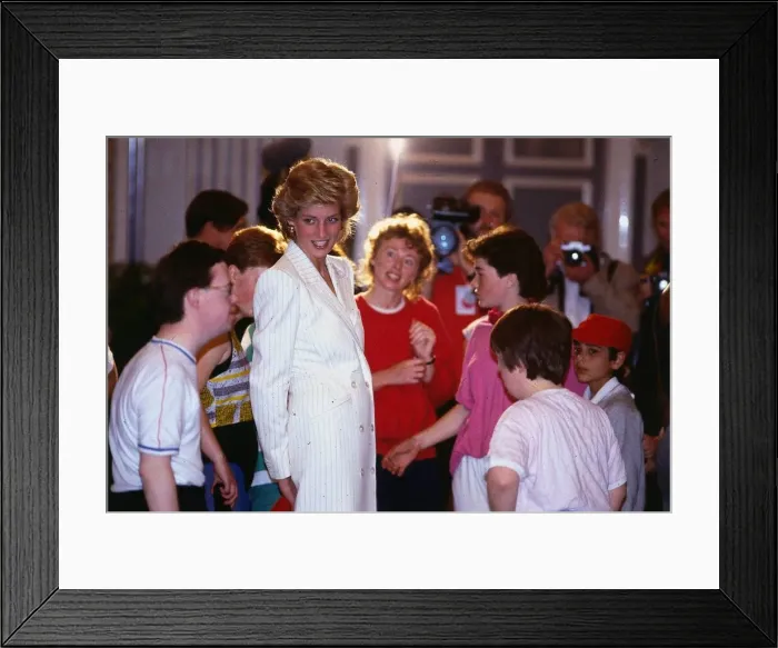 Framed Print : Princess Diana Princess of Wales talking to handicapped children during a visit to