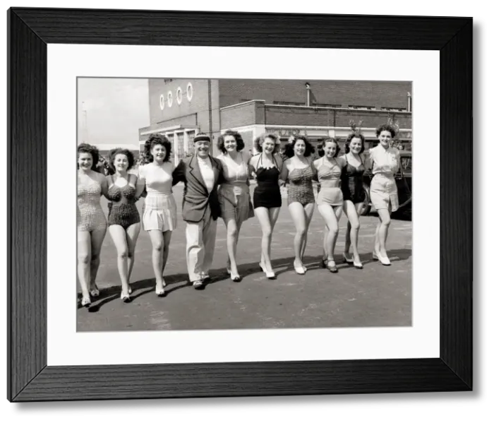 Framed Print : A line-up of girls, women wearing swimming costumes bathing suits bikinis Framed Print : A line-up of girls, women wearing swimming costumes bathing suits bikinis