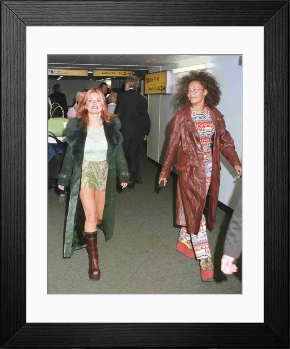 Framed Print : Spice Girls Geri Halliwell and Mel B leave Heathrow Airport for Manchester
