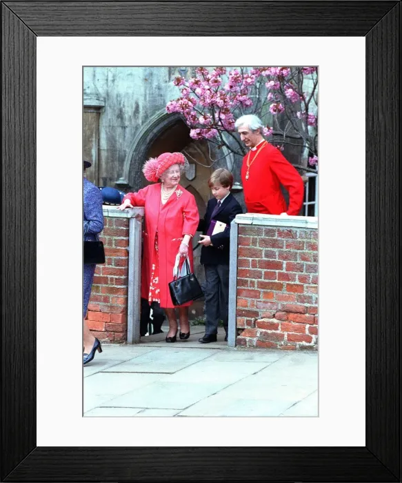 Framed Print : Queen Elizabeth, the Queen Mother, being helped by her great-grandson Prince William Framed Print : Queen Elizabeth, the Queen Mother, being helped by her great-grandson Prince William