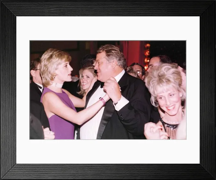 Framed Print : Princess Diana dances with American millionaire tool manufacturer Michael Wilkie at a